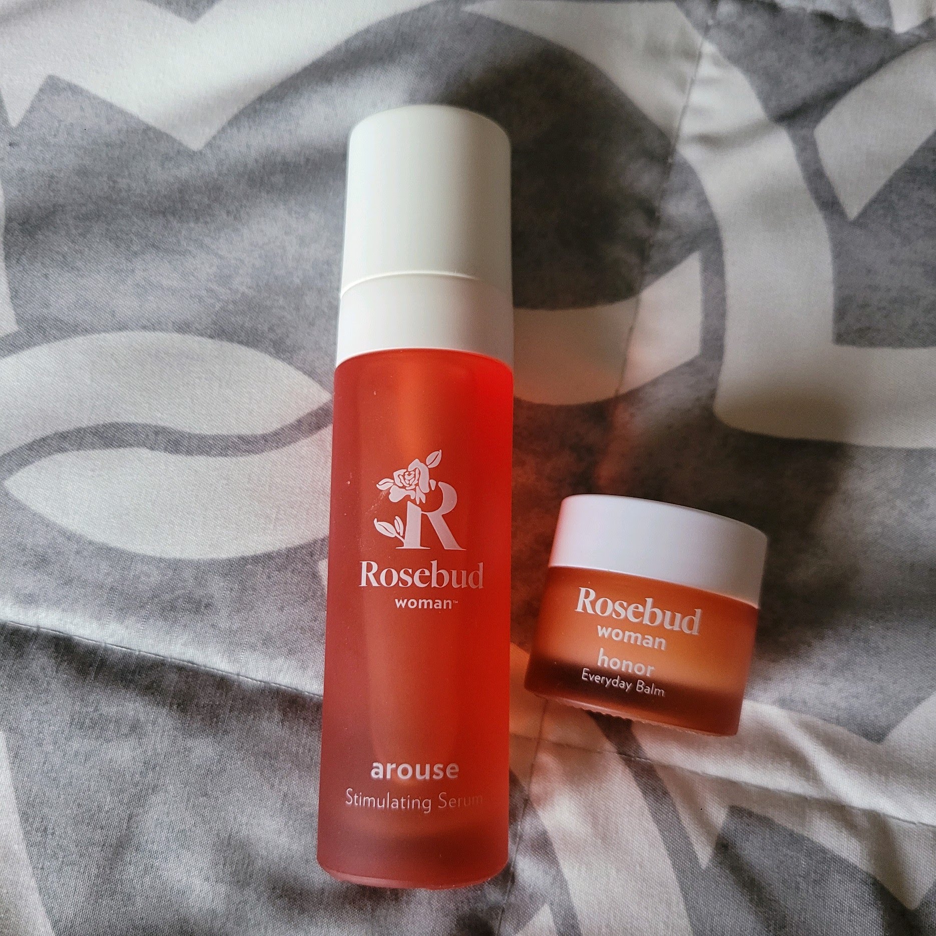 rosebud woman arouse and honor products in glass containers